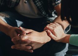 Woman consoling a man